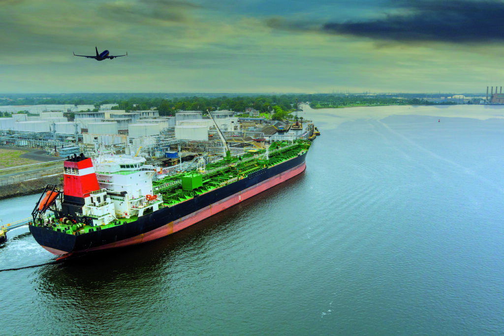 Crude oil tanker is uploading in the port terminal